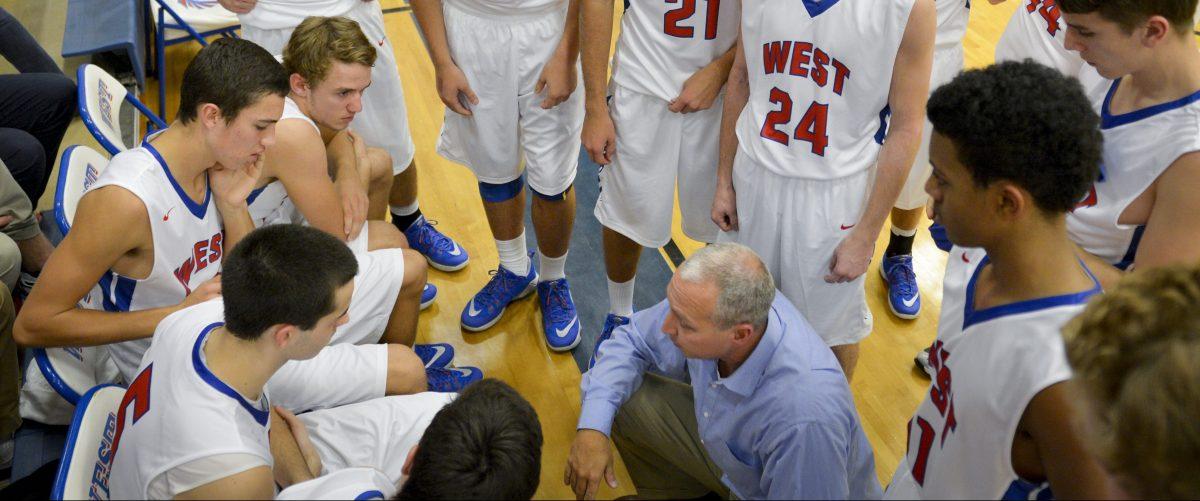 Men's basketball coach resigns