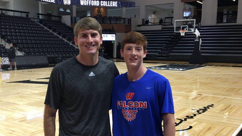 Junior Ben Bryson sits courtside for Wofford vs UNC game