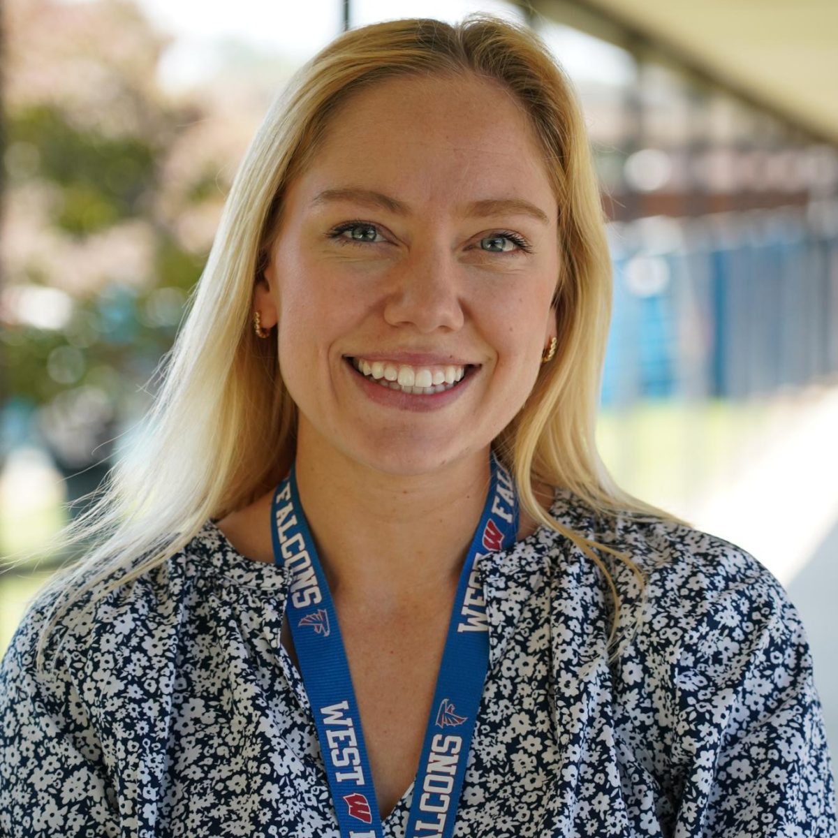 Munroe Lippard comes to West Henderson with a background in math and a love of teaching. Lippard taught at the middle school level and brings her expertise to high school. “I love being a Falcon,” says Lippard. (Photo by Chandler Franklin)