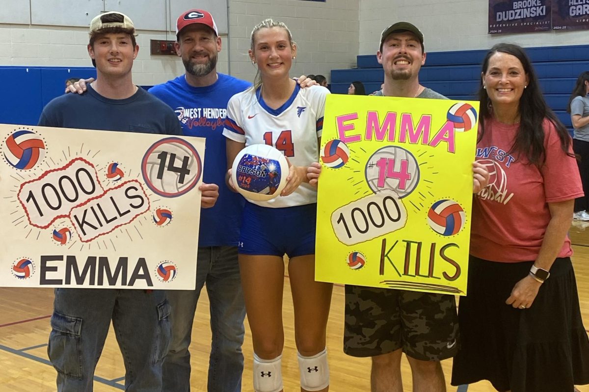 Emma Bryson posed with family to celebrate 1000 Career kills. Bryson and team defeated A.C Reynolds 3-0 in this season's home opener. 